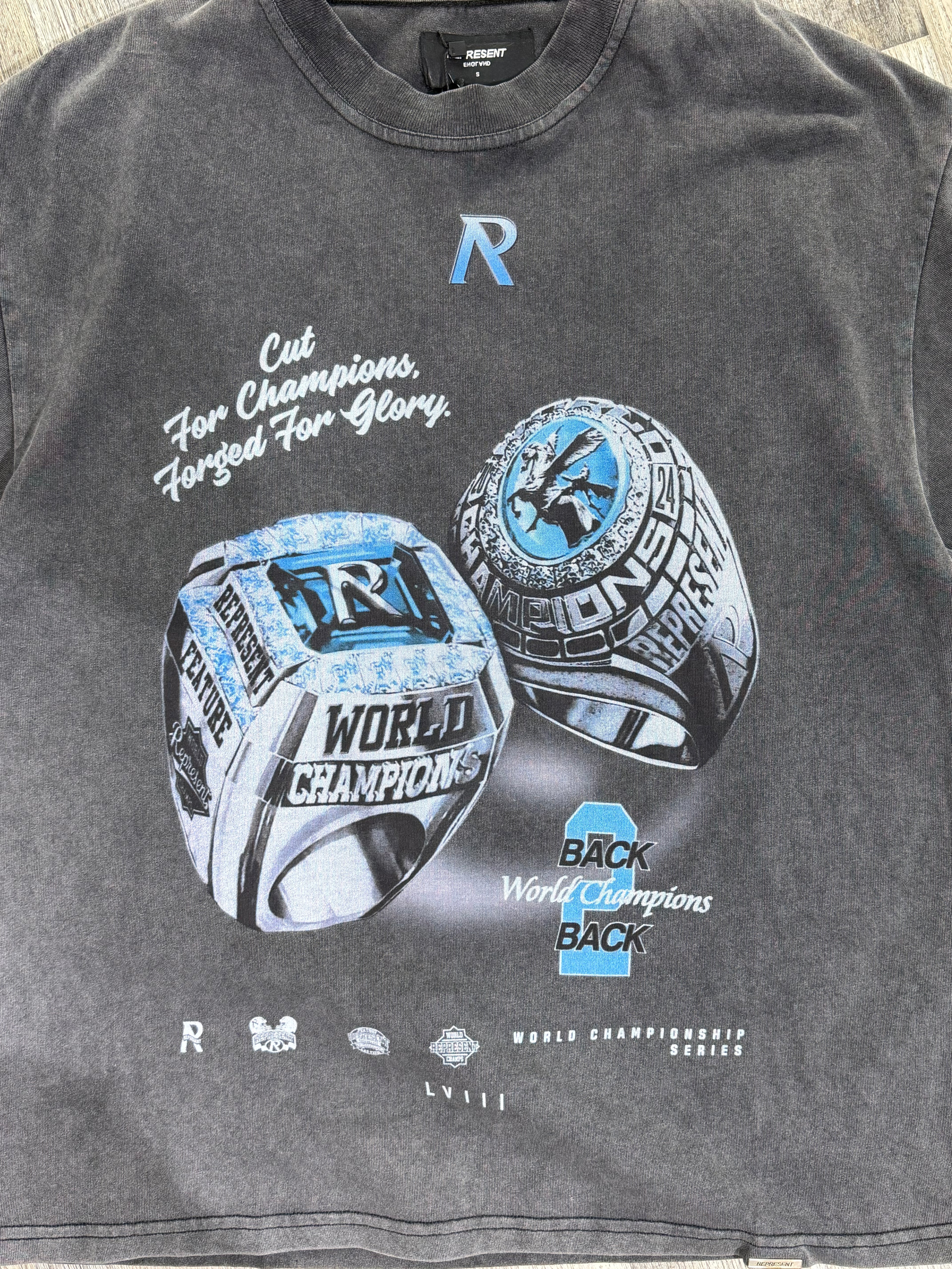 Represent “World Champions” Graphic T-Shirt – Washed Black