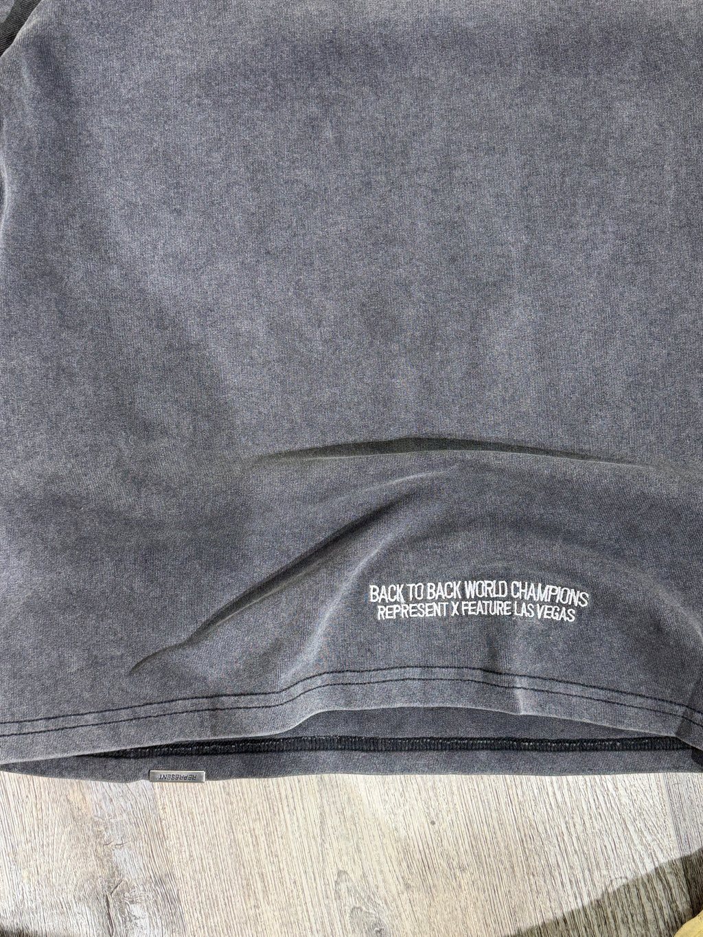 Represent “World Champions” Graphic T-Shirt – Washed Black
