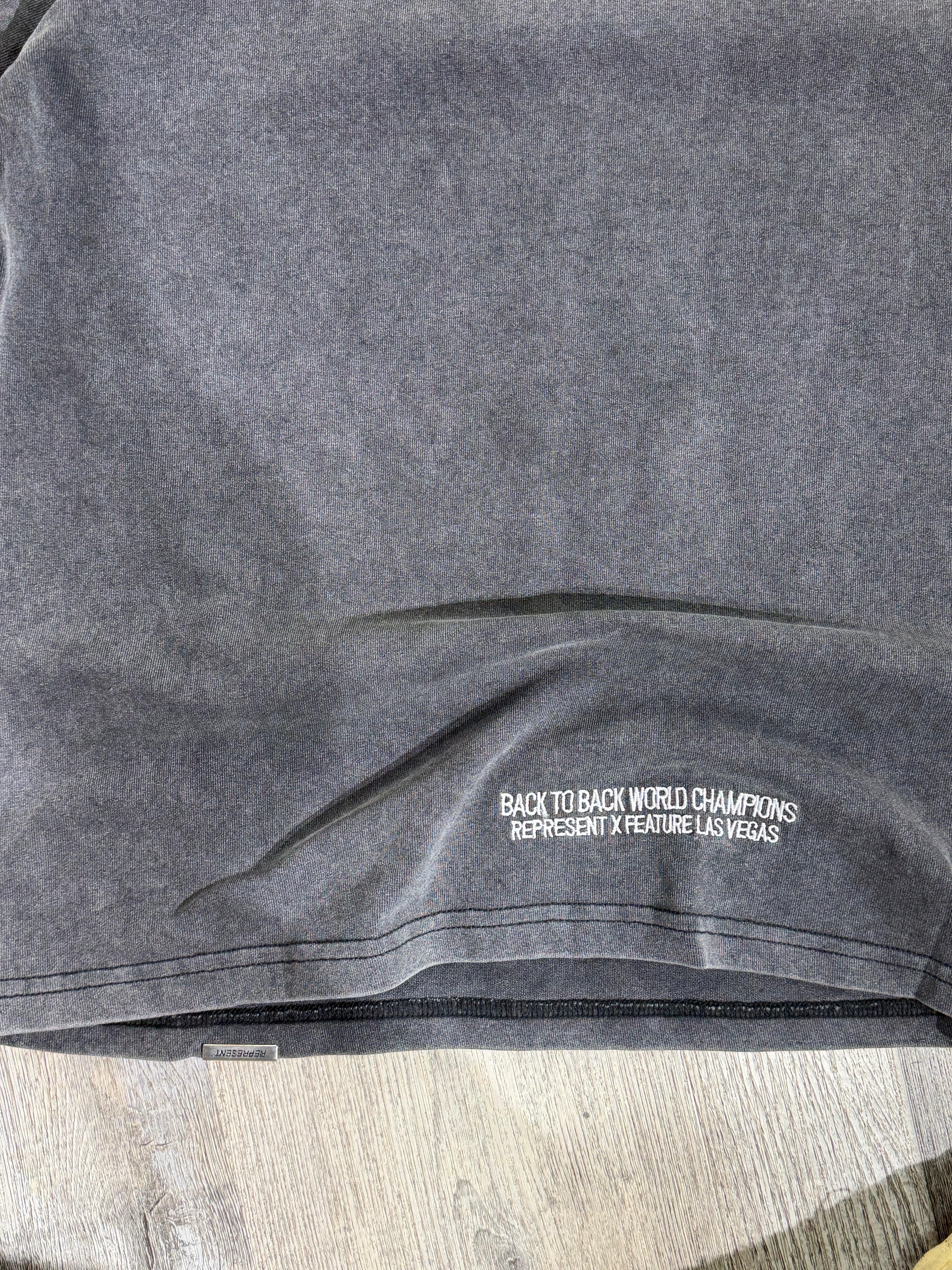 Represent “World Champions” Graphic T-Shirt – Washed Black