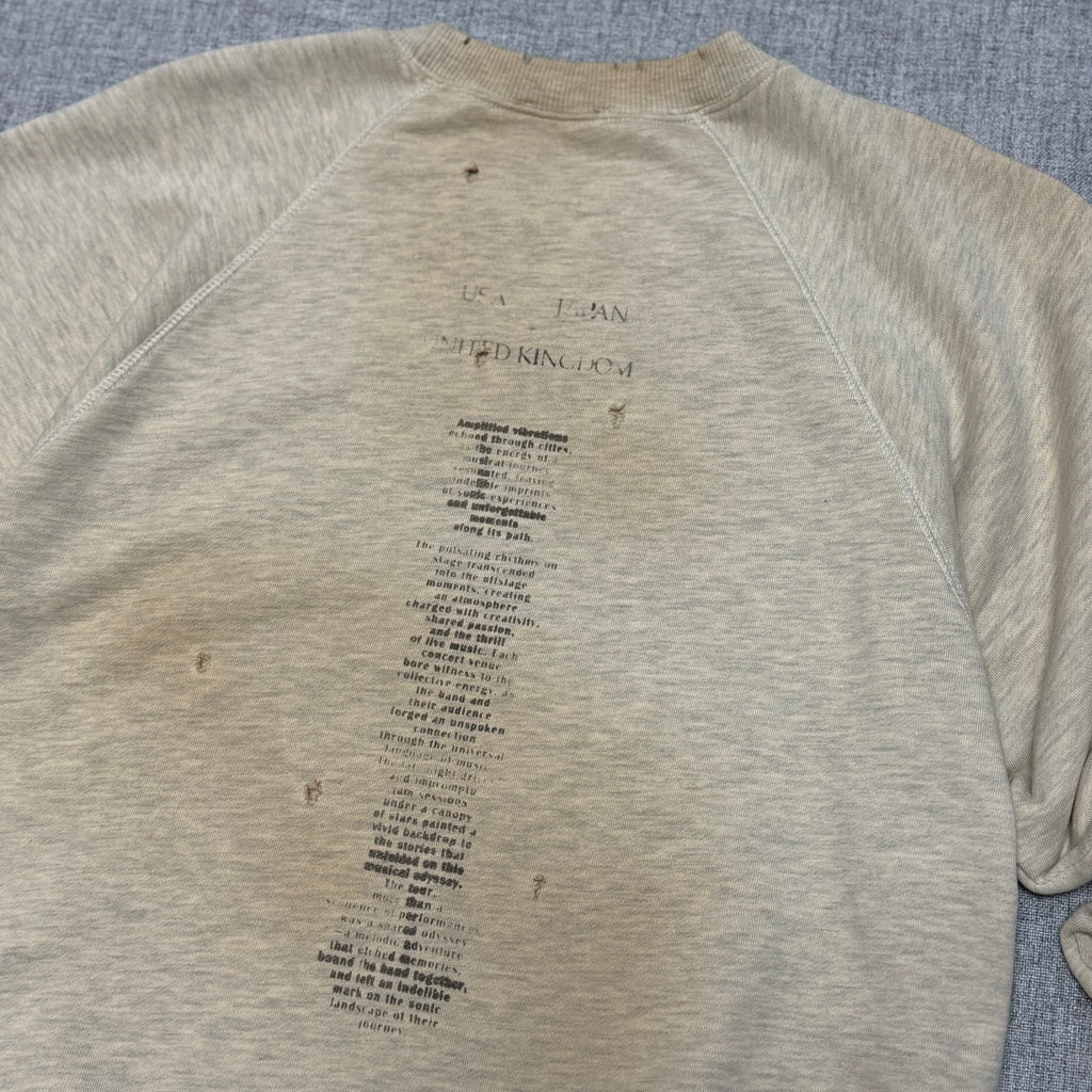 Vintage Washed Graphic Sweatshirt – Distressed Beige Crewneck