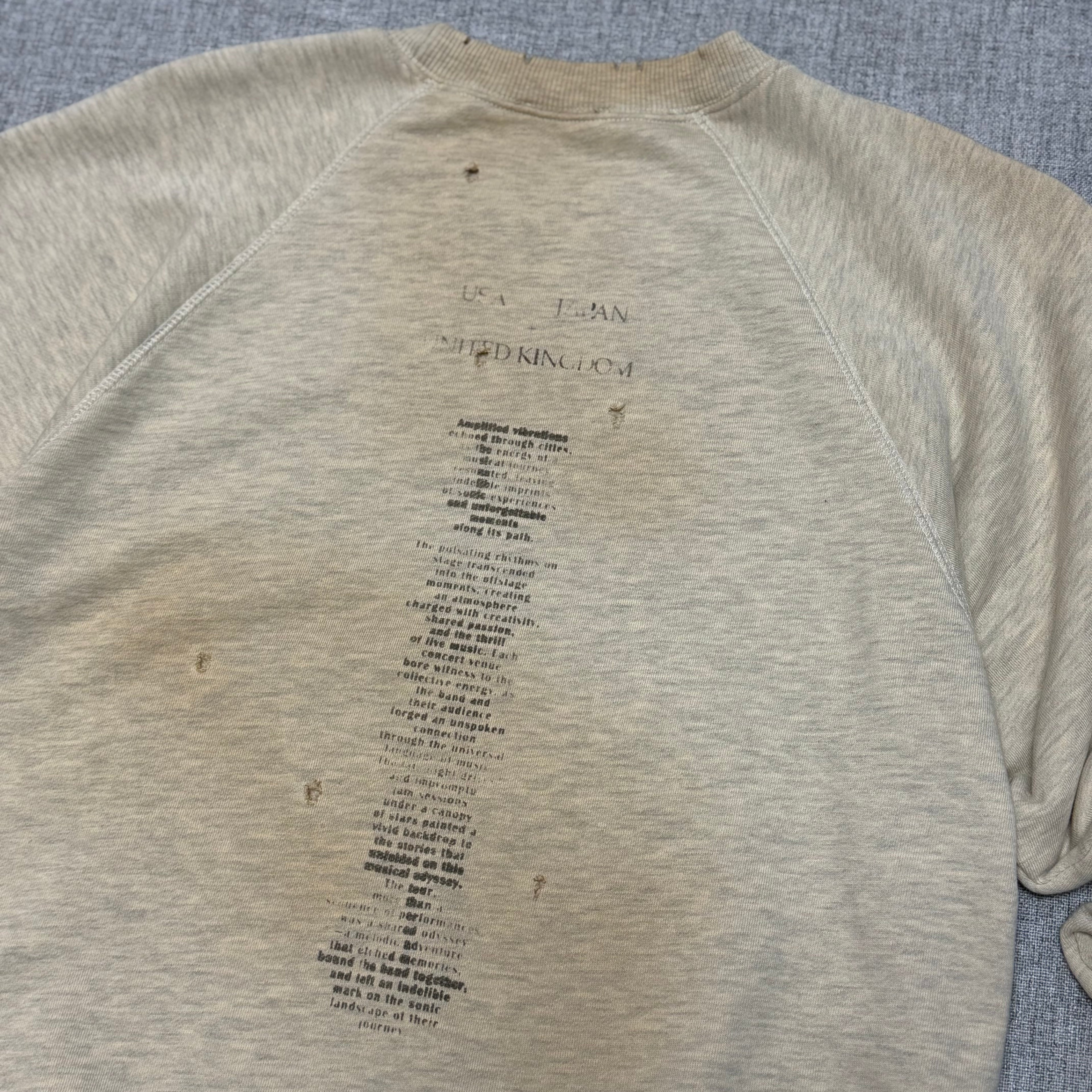 Vintage Washed Graphic Sweatshirt – Distressed Beige Crewneck