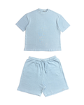 Light blue t-shirt and shorts set on a white background