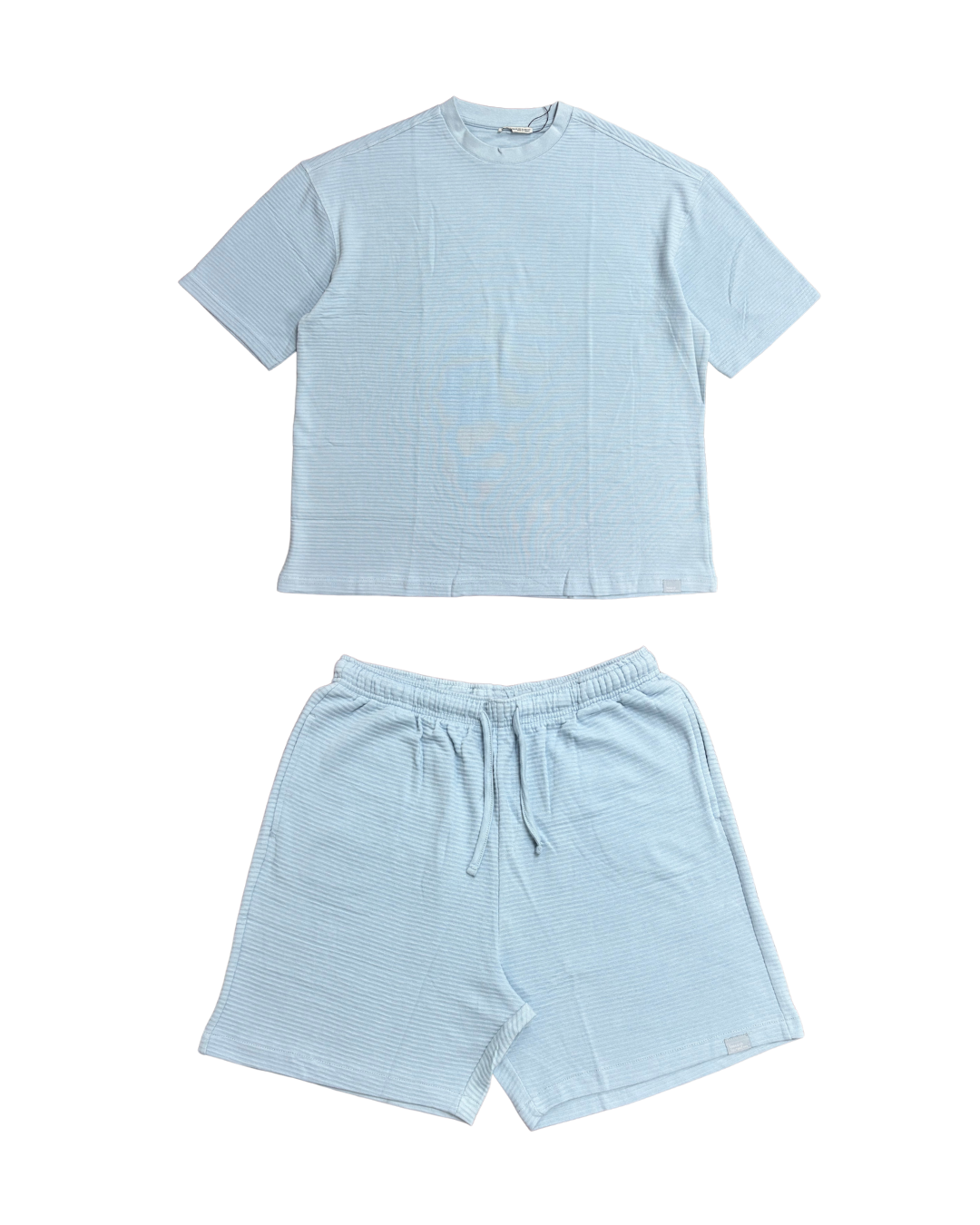 Light blue t-shirt and shorts set on a white background