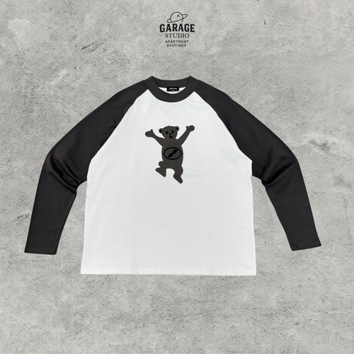 Front of white raglan long-sleeve T-shirt with black sleeves and bear chest graphic.