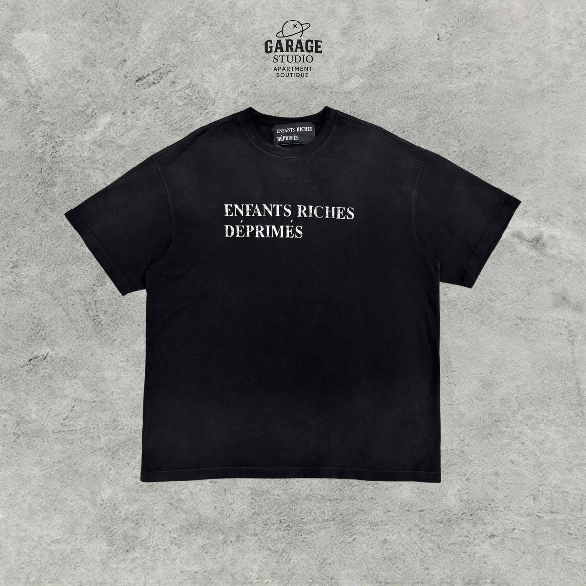 Black short-sleeve crew-neck T-shirt with white ENFANTS RICHES DÉPRIMÉS chest lettering