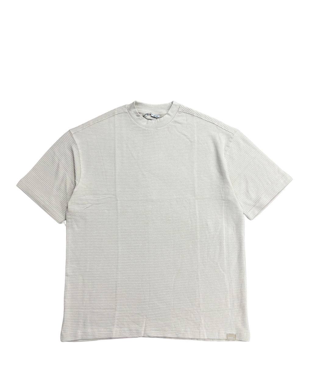 White t-shirt with subtle pattern on a white background